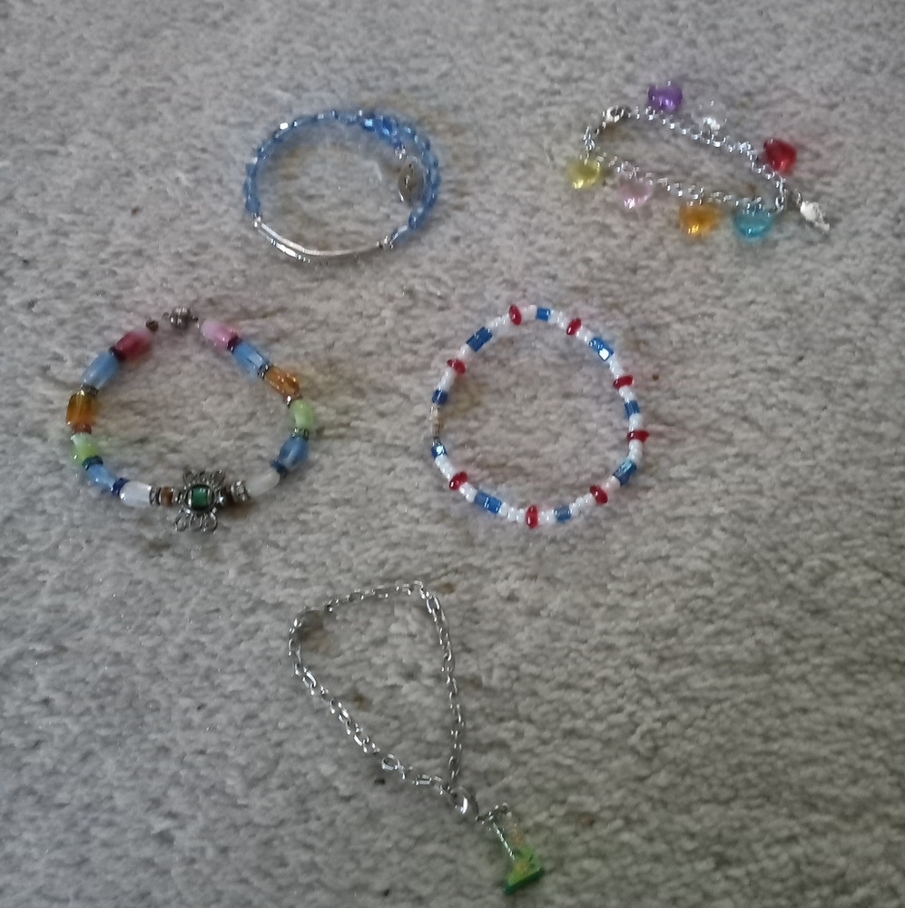 An Array Of Ornate Bracelets - image 1